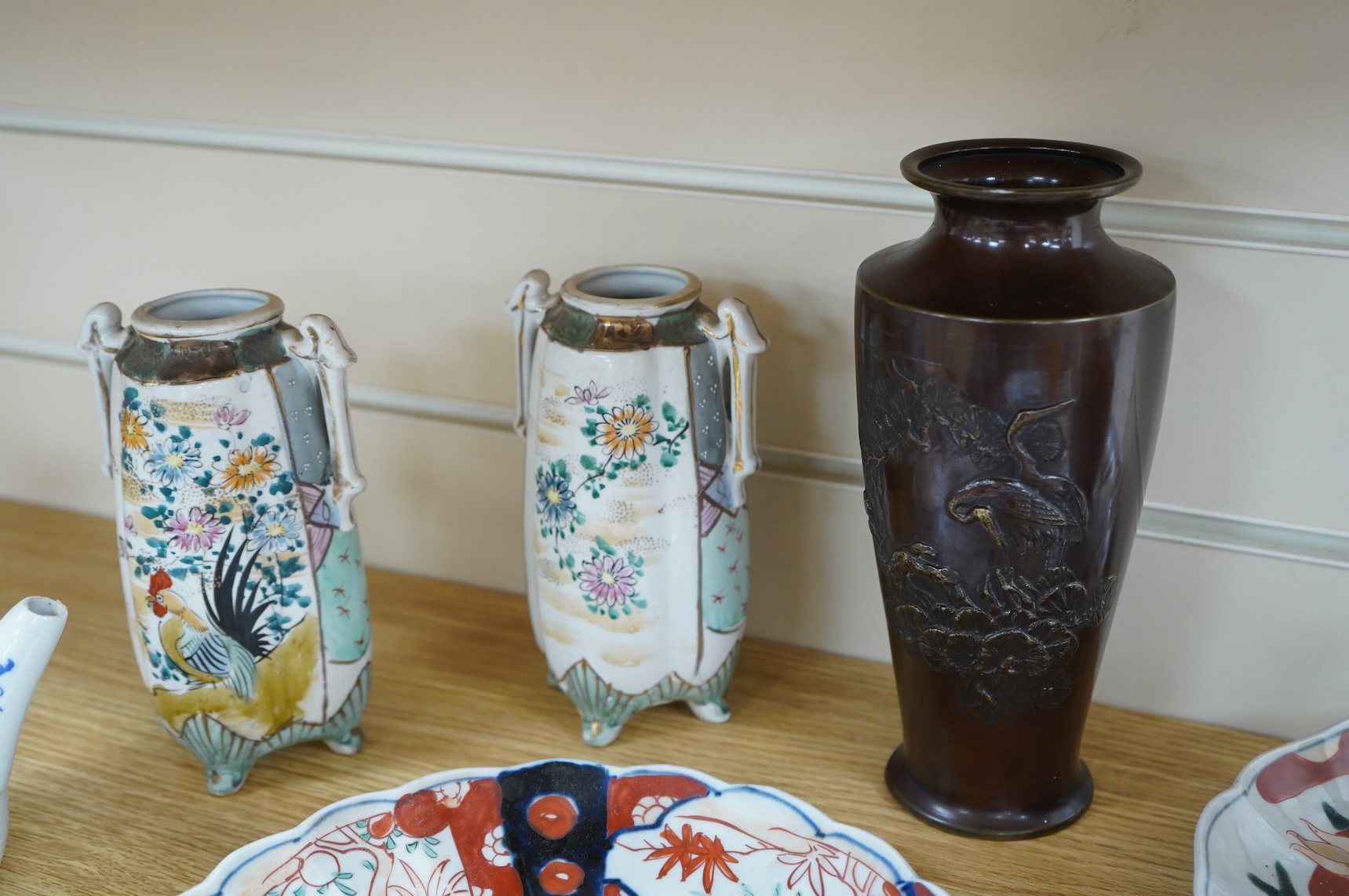 A collection of Asian ceramics to include an inside painted glass snuff bottle, pink ground dish and an Imari dish